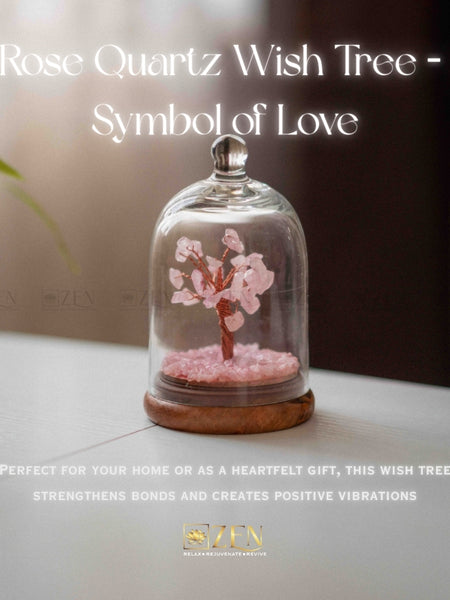 Rose Quartz Wish Tree in a glass dome on a table with text about its symbolism and uses.