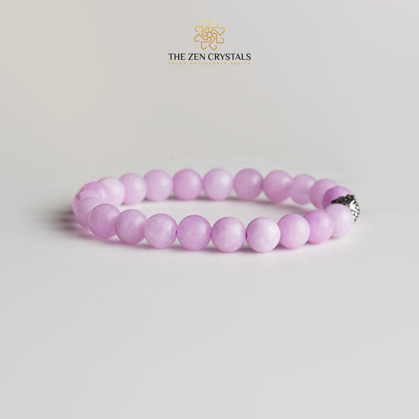 kunzite bracelet on a light gray background with 'The Zen Crystals' logo.
