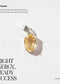 Citrine pendant with silver setting on a white background, featuring text about its properties.