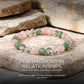 Harmony In Relationship Bracelet with rose quartz, green aventurine, and clear quartz on a stone surface with 'The Zen Crystals' branding.