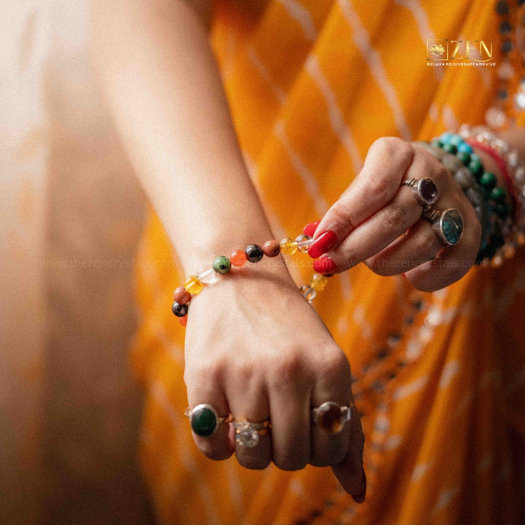 close up of a hand wearing the zen crystals ruling number 1 bracelet