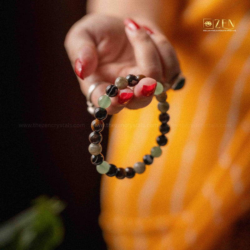 a hand holding ruling number 4 bracelet 