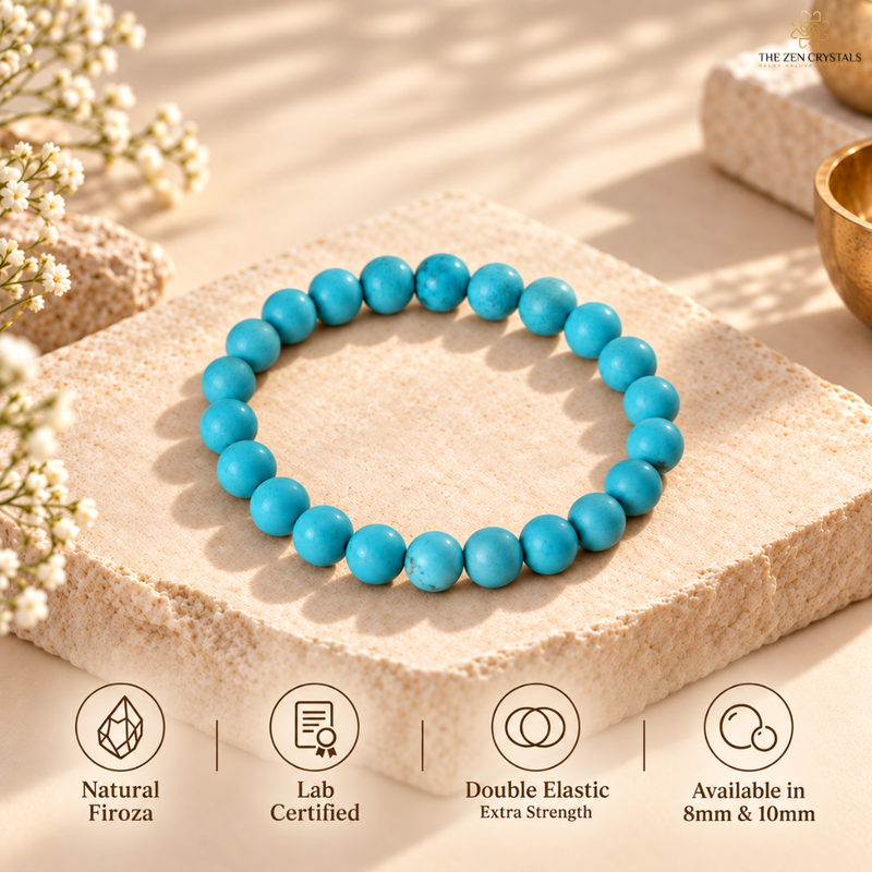 A turquoise beaded stretch bracelet displayed on a beige stone slab with decorative dried flowers and warm sunlight. Text at the bottom highlights natural Firoza, lab certification, double elastic extra strength, and availability in 8mm and 10mm.