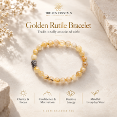 A golden-rutile beaded bracelet with a small silver-toned Buddha charm, displayed on a textured beige stone surface. The image features branding for 'The Zen Crystals' and includes informational text and icons about the bracelet's benefits.