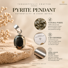 A silver pendant with a dark natural pyrite gemstone is displayed on a textured beige stone, surrounded by decorative dried flowers. The background is a warm beige with text detailing product features: 'Natural Pyrite', 'Lab Certified', and 'Steel-Alloy Pendant'.