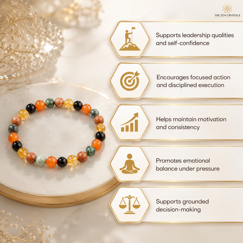 RULING NUMBER 1 BRACELET displayed on a white marble tray, with five gold text panels on the right listing its purported benefits: supports leadership qualities and self-confidence, encourages focused action and disciplined execution, helps maintain motivation and consistency, promotes emotional balance under pressure, and supports grounded decision-making. The brand name 'THE ZEN CRYSTALS' is visible in the top right corner.