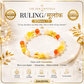 RULING NUMBER 3 BRACELET displayed on a white marble plate, with promotional text and gold decorative accents. The bracelet contains translucent yellow, orange, and white beads.