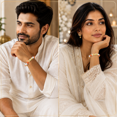 A split-screen lifestyle image showing a man and a woman wearing RULING NUMBER 3 BRACELET. Both are dressed in white traditional clothing and posed in a warm, softly lit indoor setting.