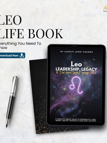 Leo Life Book on a tablet with a pen on a light marble background