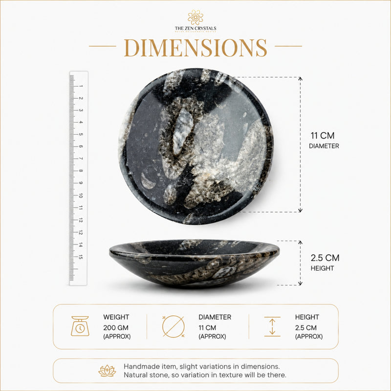 A product dimension infographic for a polished black and white stone bowl. The image shows the bowl from two angles, with a ruler on the left for scale and dimension lines indicating a diameter of 11 cm and a height of 2.
