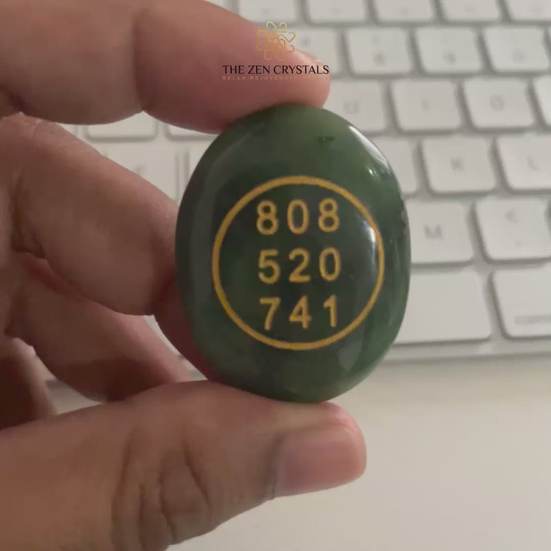 jade manifestation coin by the zen crystals